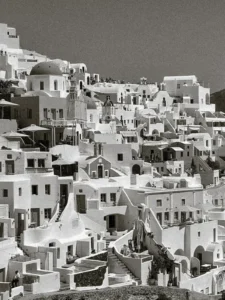 Black and white photograph of the Santorini landscape of homes and hotels