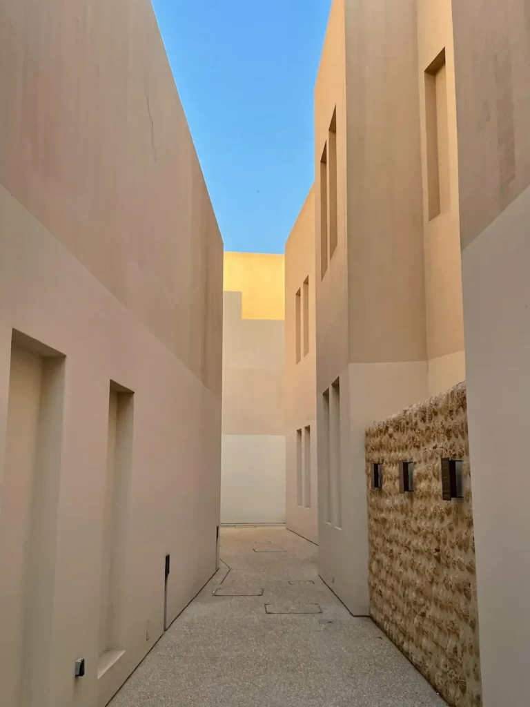 Sand coloured, old fashioned and narrow street in the Bur Dubai area