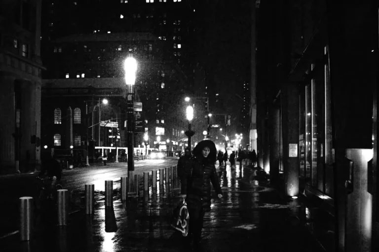 Woman walking in a rainy street in New York city